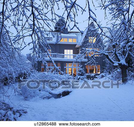 Stock Photo - Beautiful villa under the snow. Fotosearch