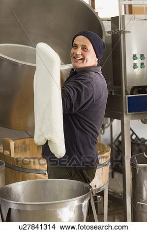 Picture - Bison mozzarella production. Fotosearch