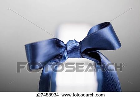 Blue ribbon on book View Large Photo Image Picture - Blue ribbon on book. Fotosearch