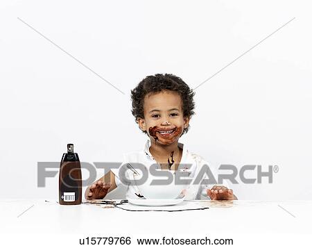 Boy covered in chocolate sauce View Large Photo Image Stock Photograph - Boy covered in chocolate sauce. Fotosearch