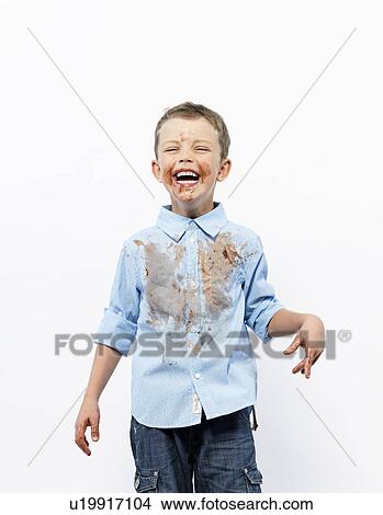 Boy covered in ice cream View Large Photo Image Picture - Boy covered in ice cream. Fotosearch