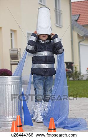 Boy hiding in rocket View Large Photo Image Stock Photograph - Boy hiding in rocket. Fotosearch