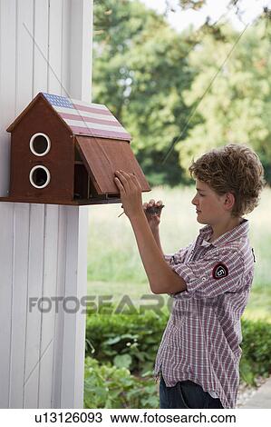 Boy in front of mail box View Large Photo Image Stock Image - Boy in front of mail box. Fotosearch