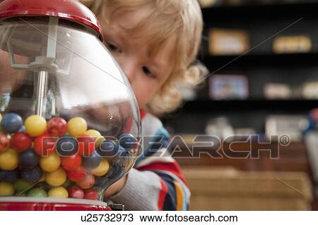 Boy looking for gum View Large Photo Image Stock Image - Boy looking for gum. Fotosearch