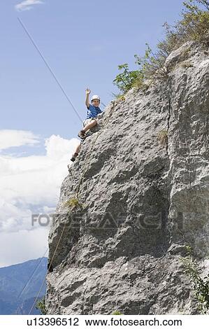 Boy upon a mountain View Large Photo Image Stock Image - Boy upon a mountain. Fotosearch