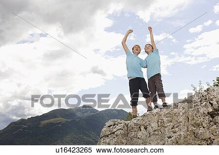 Boys in the mountains View Large Photo Image Stock Photography - Boys in the mountains. Fotosearch