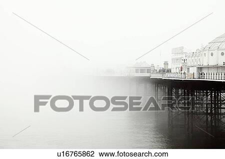 Stock Image - Brighton pier in the fog. Fotosearch