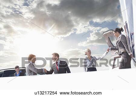 Business executives on corporate jet View Large Photo Image Picture - Business executives on corporate jet. Fotosearch