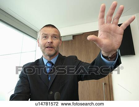 Business leader gives speech View Large Photo Image Stock Image - Business leader gives speech. Fotosearch