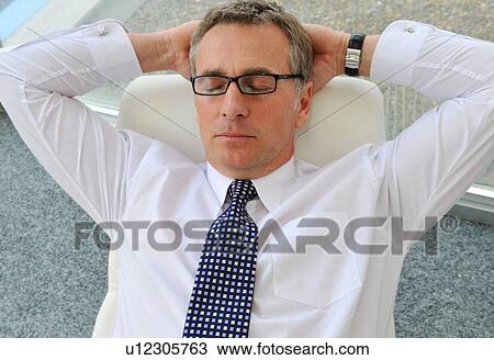 Business man asleep View Large Photo Image Stock Image - Business man asleep. Fotosearch