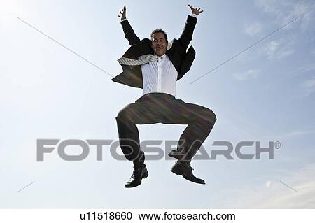 Business man jumping View Large Photo Image Stock Image - Business man jumping. Fotosearch