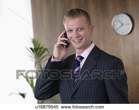 Business man on the phone View Large Photo Image Stock Photography - Business man on the phone. Fotosearch