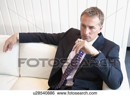 Business man waits View Large Photo Image Stock Photograph - Business man waits. Fotosearch