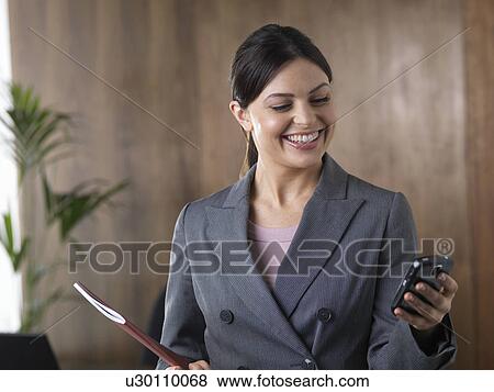 Stock Photo - Business woman on the phone. Fotosearch