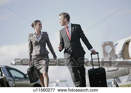 Stock Photo - Businessman and Businesswoman. Fotosearch