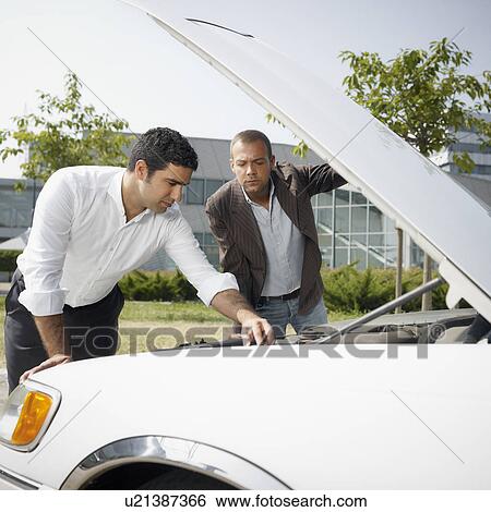 Stock Photograph - Businesspeople with broken car. Fotosearch