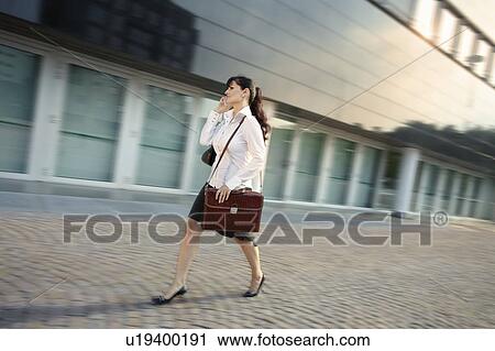 Businesswoman outdoors View Large Photo Image Stock Image - Businesswoman outdoors. Fotosearch