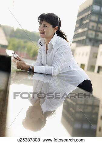 Businesswoman outdoors View Large Photo Image Stock Photo - Businesswoman outdoors. Fotosearch