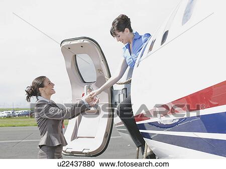 Stock Image - Businesswomen united. Fotosearch