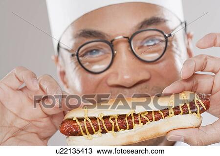 Chef with Hotdog View Large Photo Image Stock Image - Chef with Hotdog. Fotosearch
