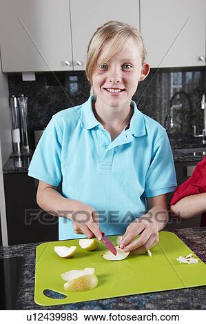 Child preparing food View Large Photo Image Stock Image - Child preparing food. Fotosearch
