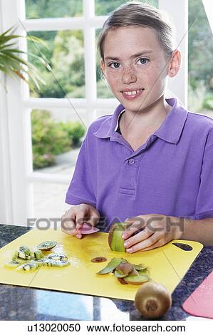 Child preparing food View Large Photo Image Stock Image - Child preparing food. Fotosearch