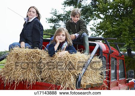 Children sitting on 4x4 landrover View Large Photo Image Stock Photo - Children sitting on 4x4 landrover. Fotosearch