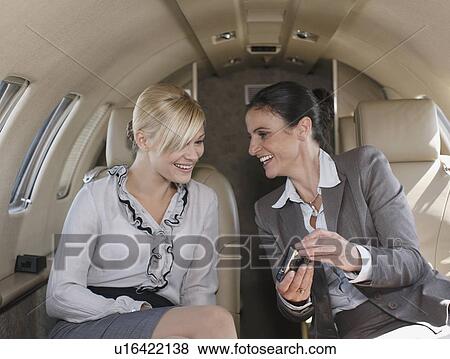 Stock Photo - Contended businesswomen. Fotosearch