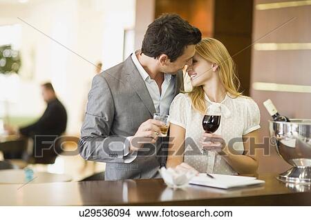 Couple at bar View Large Photo Image Picture - Couple at bar. Fotosearch