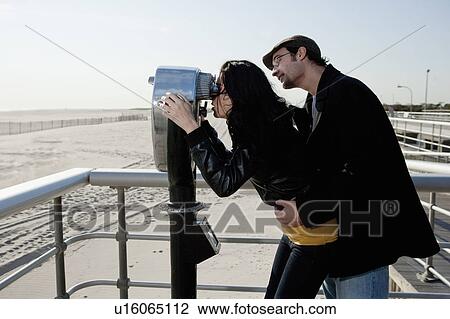 Couple at the beach View Large Photo Image Stock Image - Couple at the beach. Fotosearch