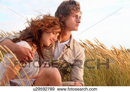 Stock Photo - Couple at the beach. Fotosearch