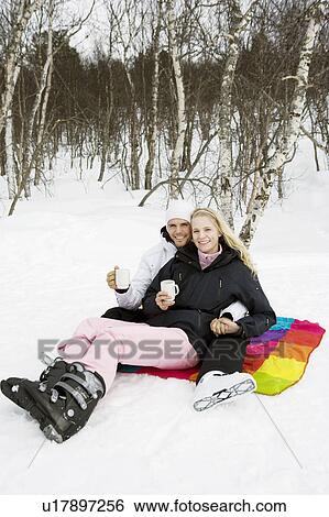 Couple drinking tee View Large Photo Image Stock Photograph - Couple drinking tee. Fotosearch