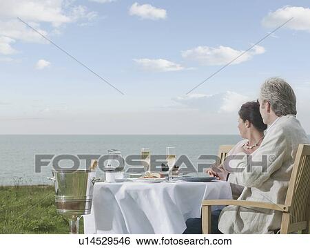 Stock Photograph - Couple enjoying the view. Fotosearch