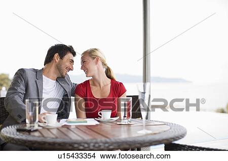 Picture - Couple flirting. Fotosearch