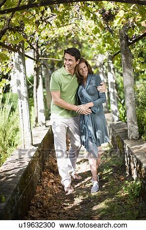 Couple going for a walk in nature View Large Photo Image Stock Image - Couple going for a walk in nature. Fotosearch