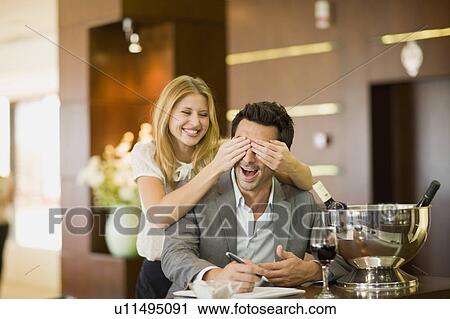 Couple having fun at bar View Large Photo Image Stock Image - Couple having fun at bar. Fotosearch