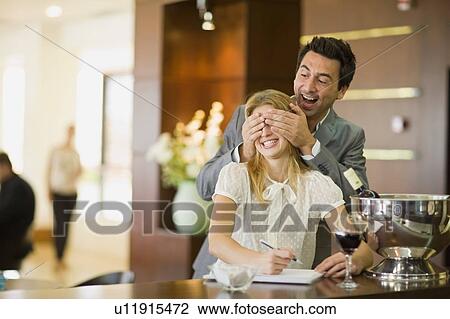 Couple having fun at bar View Large Photo Image Stock Image - Couple having fun at bar. Fotosearch