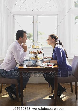 Couple having tea View Large Photo Image Stock Image - Couple having tea. Fotosearch