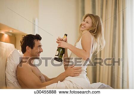 Stock Photo - Couple in bed. Fotosearch