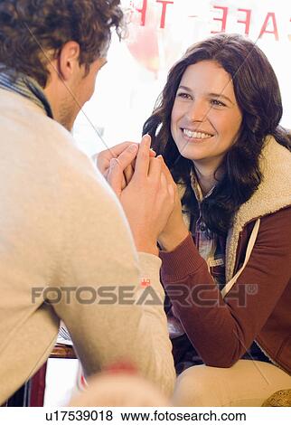 Couple in cafe View Large Photo Image Stock Photo - Couple in cafe. Fotosearch