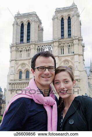 Couple in front of Notre Dame Paris View Large Photo Image Stock Photograph - Couple in front of Notre Dame Paris. Fotosearch