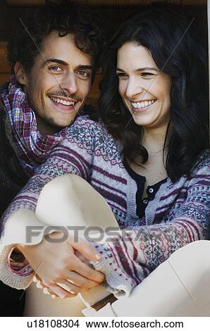 Couple in hut View Large Photo Image Picture - Couple in hut. Fotosearch