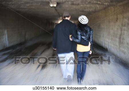 Couple in tunnel View Large Photo Image Stock Image - Couple in tunnel. Fotosearch