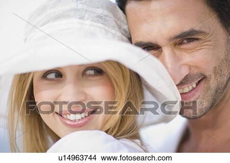 Couple in white View Large Photo Image Picture - Couple in white. Fotosearch