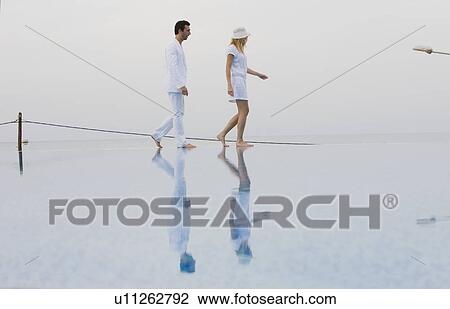 Stock Image - Couple in white. Fotosearch