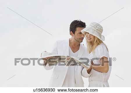 Stock Image - Couple in white. Fotosearch