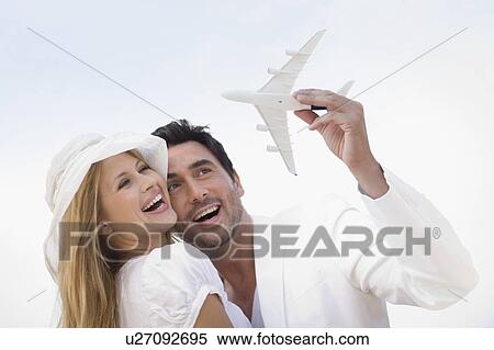 Couple in white View Large Photo Image Stock Photography - Couple in white. Fotosearch