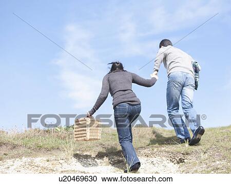 Stock Image - Couple on a day out. Fotosearch