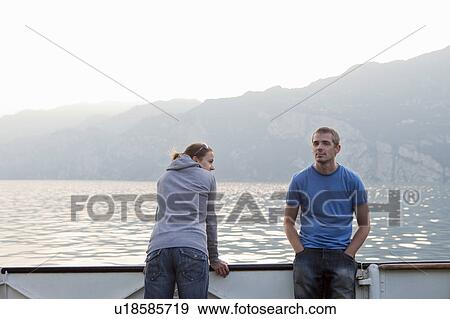 Couple out at sea View Large Photo Image Stock Photo - Couple out at sea. Fotosearch