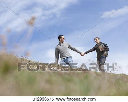 Couple reconnecting View Large Photo Image Stock Photography - Couple reconnecting. Fotosearch